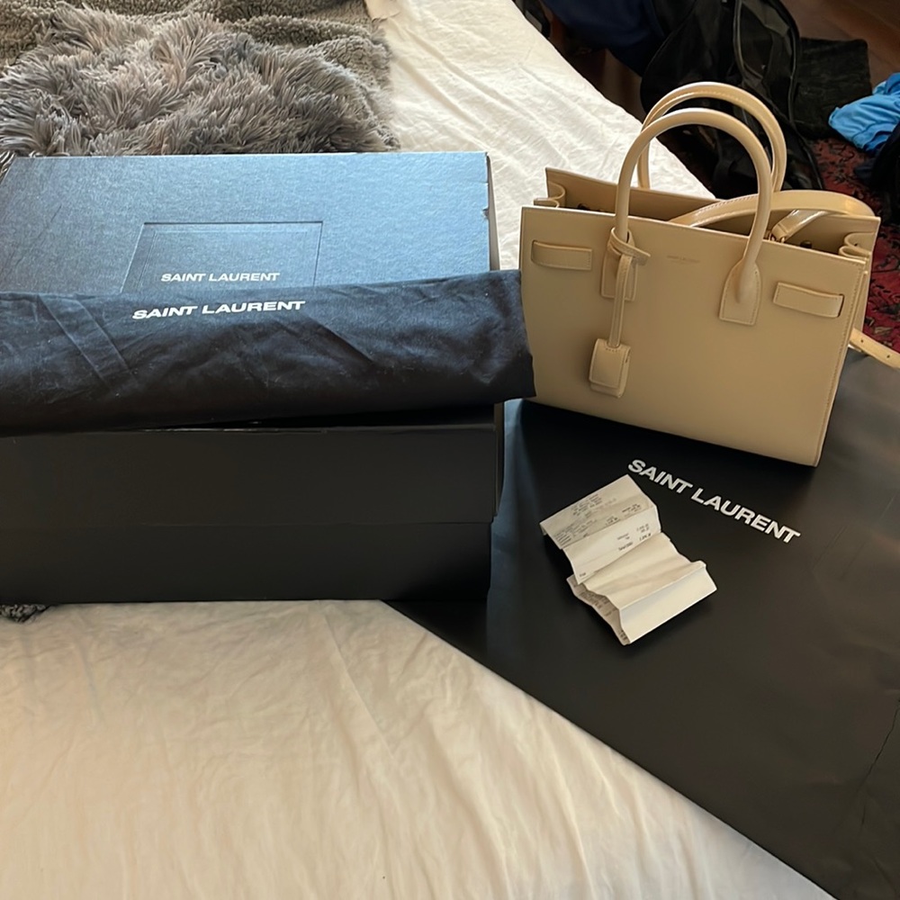 Gorgeous like new YSL Sac Du Jour baby handbag in cream